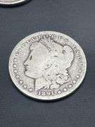 THREE MORGAN SILVER DOLLARS