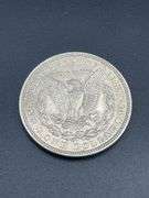 FIVE MORGAN SILVER DOLLARS