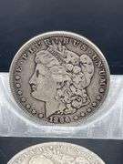 TWO MORGAN SILVER DOLLARS