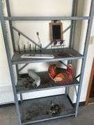 Metal Shelving Unit with Assorted Items
