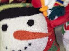 Assorted Holiday Plush Toys and Pillow