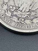 FOUR MORGAN SILVER DOLLARS