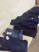 A VARIETY OF WOMENS JEANS- 1- PAIR OF JEAN SHORTS- SIZES 10- 12- 14- DIFFERENT BRANDS