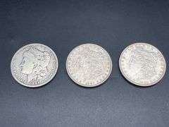 THREE MORGAN SILVER DOLLARS