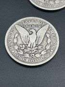 FOUR MORGAN SILVER DOLLARS