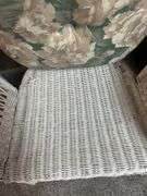 White Wicker Accent Chair with Floral Cushion
