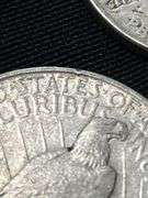 Three 1922 Peace Silver Dollars