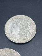 FIVE MORGAN SILVER DOLLARS