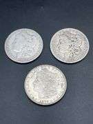 THREE MORGAN SILVER DOLLARS