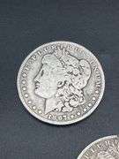 THREE MORGAN SILVER DOLLARS