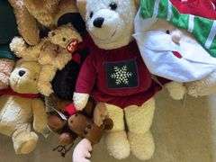 Assorted Plush Holiday Toys: Bears, Moose, and Santa