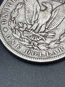 FOUR MORGAN SILVER DOLLARS