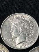 Three 1924 Peace Silver Dollars