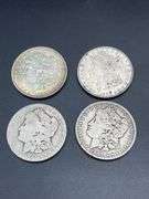 FOUR MORGAN SILVER DOLLARS