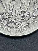 THREE MORGAN SILVER DOLLARS