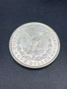 FIVE MORGAN SILVER DOLLARS