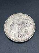 THREE MORGAN SILVER DOLLARS