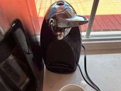 Household Kitchenware Assortment: Coffee Maker, Toaster, Mixer, and More