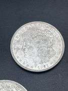 FIVE MORGAN SILVER DOLLARS