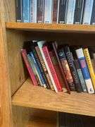 Book Shelf and Collection of John MacArthur 'Grace to You' Books, Commentaries, and Media