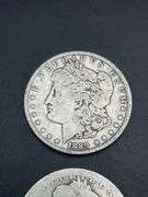 FOUR MORGAN SILVER DOLLARS