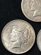 Three 1923 US Peace Silver Dollars