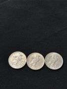 Three 1925 US Peace Silver Dollars