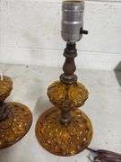 TWO VINTAGE AMBER GLASS LAMPS