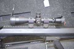 Barrett Firearms Model 99 Bolt Action Rifle In .50 BMG Caliber With 4.5-14 Power Leupold Scope,