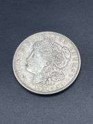 FIVE MORGAN SILVER DOLLARS
