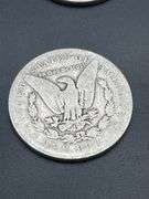 FOUR MORGAN SILVER DOLLARS