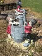 Figural Garden Water Pump Statue