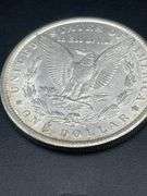 TWO MORGAN SILVER DOLLARS