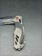 Three Pocket Knives: Smith & Wesson, Ozark Trail, and Tac-Force