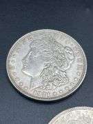 FIVE MORGAN SILVER DOLLARS