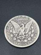 THREE MORGAN SILVER DOLLARS
