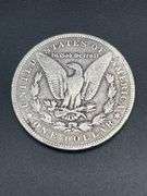 THREE MORGAN SILVER DOLLARS