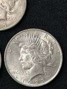 Three 1923 US Peace Silver Dollars