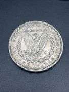 FIVE MORGAN SILVER DOLLARS