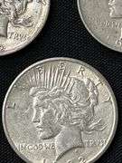 Three 1922 Peace Silver Dollars