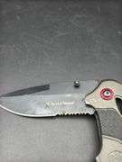 Three Pocket Knives: Smith & Wesson, Ozark Trail, and Tac-Force
