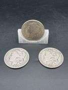 THREE MORGAN SILVER DOLLARS