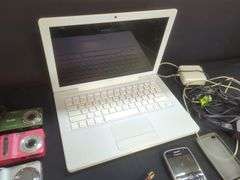 Apple MacBook, Cameras, Cell Phones, iPod, Canon Camcorder, and Watches