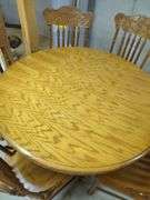 Extendable Round Wood Dining Table with Six Chairs