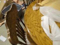 Extendable Round Wood Dining Table with Six Chairs