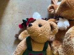 Assorted Plush Holiday Toys: Bears, Moose, and Santa