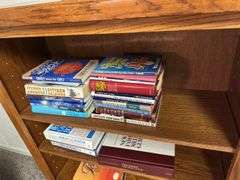 Wooden Bookcase with Books and Crochet