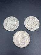 THREE MORGAN SILVER DOLLARS