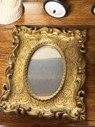 Assorted Decorative Collectibles: Framed Art, Mini Red Wagon, Floral Plaque, and More