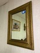 Assorted Decorative Items: Framed Artwork, Wall Sconces, and Horseshoe Decor